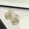 Nowy złoty stadnina Letter C Logo marka Kobieta Tassel Długie Earing Projektant luksusowy biżuteria kryształowy Pearl Hoop kolczyki 7338