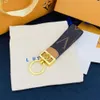 Designer prydnad läder ny bilväska nyckelring kvinnor 2023 guld kärlek gåvor älskare nyckelring mode mångsidiga lanyards för nycklar