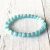 Bracelet œil de chat bleu clair de Style perles lumineuses, bijoux de guérison du poignet, Yoga Mala, breloque, cadeau pour hommes, brins de perles 255R