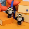 Design sac charmes Designer Couples chaîne nouveau Suower porte-clés pendentif mignon Panda porte-clés accessoires de mode pour femmes hommes