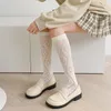 Calcetines de mujer JK Lolita medias largas ahuecadas malla de encaje Color sólido negro blanco Beige rodilla