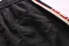 Shorts pour hommes Designers d'été Sports décontractés 2021 Mode Séchage rapide Hommes Pantalons de plage Noir et bleu Taille asiatique M-XXXL