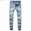 Mäns jeans män randiga safari -stil märke repade svarta jeans mager rippade förstörda stretch smala fickbyxor med hål män jeans x0621 l230918