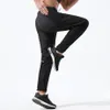 Luu Designer Luksusowe Summer Men Pants Rysuj liną elastyczną talię ćwiczenie fitness bieganie na zewnątrz szybkie suszenie spodni Joggers Run257z