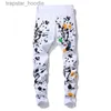 Jeans pour hommes Hommes Pantalons blancs imprimés Designer Graffito Splash Ink Peinture Couleur Street Fashion Cool Pantalon en coton unique pour hommes L230918