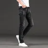 Mäns jeans smala grå svarta män mode trend stretch denim byxor plus storlek 42 44 46 regelbundna passformar manliga märke kläder213r