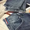 Mannen Broek Gescheurde Jeans Mannen Zomer 2021 Nieuwe Koreaanse Mode Bedelaar Rotte Broek Slim Fit Licht Negen Legged broek J230918