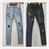 Ny stil 20SS MENS DESIGNER AMJEANS CRANE HOLE VINTAGE DENIM PANTS Fashion Spray Paint Clothing Hip Hop Skinny Jeans Storlek 2836232L