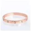 Bracciale rigido La bellissima coppia Bracciale zirconi in oro con gioielli da donna in acciaio inossidabile Carta regalo Fibbia Brac2486