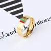Anéis de designer para mulheres listras vermelhas e verdes anéis ouro prata rosa masculino jóias de luxo titânio aço banhado a ouro nunca desbota no240u