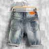 Plus storlek denim shorts manlig sommarstil hål jeans nostalgiska fötter flänsande tiggare shorts knä längd jeans hög kvalitet285j