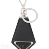 Bil Black Keychain Luxury Mens Keychains Designer Luxury Handväska Plånbok Tillbehör Läder Black Heart Womens Key Ring Metal Small Lanyard PJ056