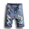 Nya sommarmens hål denim shorts mode män denim jeans smala raka byxor trend mens designer byxor1186y