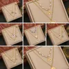 Nouveaux bijoux gouttes huile yeux collier en acier inoxydable amour chaîne double couche collier polyvalent chaîne médaillon en or colliers pour femmes