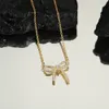 Nouveau designer unisexe femme 18 carats colliers d'arc en or pour femmes argent pendentif à la mode bijoux de mode mère cadeau de Saint Valentin pour petite amie accessoires en gros