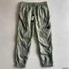 Metal 2023 SS Nylon Men Pants One obiektyw Pocket Pocket Panting Outdoor Tracksuit swobodny jogging spodni CP Designer V29M