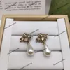 Tasarımcı Mücevher Çilek Küpeleri Çok yönlü stil ve elmas set çift harfli inci aslan baş ailesi kadınlar için