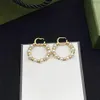 Mais novo designer de pérola círculo brincos charme feminino dupla carta eardrop menina pingente studs para festa data gift2656