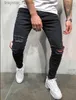 Jeans masculinos exclusivos mens slim fit rasgado fita skinny jeans designer de moda hi-street angustiado denim joggers joelho buracos lavados destruídos calças casuais l230918