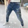 Men's Jeans Hommes jean maigre marque Graffiti imprimé jean hommes printemps été personnalité lavage élastique mince homme petit pied Denim pantalon 230918