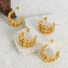 Guldpläterad 18K koreansk version av Instagram Niche Light Luxury Design Sense Minimalist All-in-One gradvis pärlstav C-formade örhängen