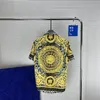 Mężczyźni designerskie koszule Summer Shoort Sleeve Casualne koszule moda luźna polo w stylu plażowym oddychając Tshirts Tees Ubranie #562736