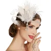 Bandeaux Autres accessoires de mode Bandeau en plumes de paon 1920 Flapper Girl Headpiece avec pompon Vintage Party Pography Accessoires pour cheveux 230918