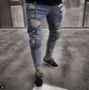 Mäns jeans män jeans män stilfulla rippade byxor cyklist mager smala rakt frayed denim byxor nya mode magiska jeans män kläder y2303 l230918