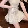 Gonne giapponese Kawaii Lolita fasciatura con fiocco minigonna in maglia donna inverno bianco rosa pizzo dolce a-line a vita alta coreano Y2k