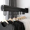 Hangers Aan de muur gemonteerde onzichtbare opvouwbare kleerhanger Balkonraam Eenvoudige luchtstang voor binnen en buiten