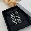 Marke: Lange baumelnde Ohrringe für Damen in klassischer Form, modische, hohle Diamant-Damenohrringe, Großhandel, Geschenke, Designer-Schmuck mit Logo-Dropshipping