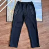 2024 Pantaloni da uomo Pantaloni sportivi in pile tecnico Pantaloni casual in maglia che corrono stile alla moda da strada