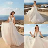 Boho Eddy K Abiti da sposa a-line Appliqud in pizzo Sexy scollo a V senza maniche Abito da sposa senza schienale Sweep Train Abito da sposa economico da spiaggia 249P