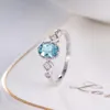 Anneaux de cluster Imitation Natural Sea Blue Topaz Simple Open Ring Féminin