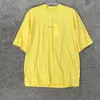 T-shirt uomo donna 23SS estate nuova semplice tinta unita foto reale girocollo manica corta lettera piccola stampa logo Top Tee