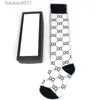 Chaussettes pour hommes Bas de luxe Designer Hommes Femmes Chaussettes bas de laine de haute qualité rues seniors chaussettes de genou confortables avec boîte L230919