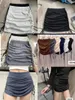 Jupes taille haute cordon de serrage à lacets jupe courte élastique pour les femmes 2023 printemps et été mince vêtements chauds jupe-pantalon usine
