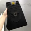 Men's Jeans Designer Autumn and Winter Xintang Cotton Bullet Korean Edition Small Foot Slim Fit Pure Black High end European Embroidery Medu OVRW