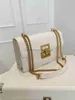 Axelväskor europeiska retro kvinnors väska modekedja liten fyrkantig väska kreativ låsknapp postman bagstylishhandbagsstore