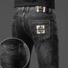 Jeans para hombres Diseñador 2023 Nuevo para luz de lujo Edición coreana Pies elásticos gruesos Slim Fit Juventud Pantalones azules y negros X82G