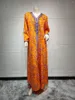 Vêtements ethniques 2023 Robe musulmane Printemps Été Mode Style Femmes Manches longues Col V Polyester Impression Orange Abaya