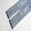 Designer new high street fashion brand straight barrel knife cut damaged old washed jeans casual pants