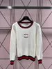 The designer's new autumn knitted sweater hollowed out small fragrance color round neck sleeve long sleeve loose women's blouse