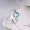 Anneaux de cluster Imitation Natural Sea Blue Topaz Simple Open Ring Féminin