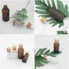 Packing Bottles Wholesale Frosted Amber White Glass Dropper Bottle 15Ml 30Ml 50Ml With Bamboo Cap 1Oz Wooden Essential Oil Drop Delive Dhyb9