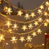 LED STRINGSクリスマスデコレーションスノーフレークスターストリングライトガーランドバッテリー駆動の妖精の照明ランプXamsツリー装飾hkd230919