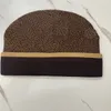 Europeiska designer snö beanies kvinnor män vinter ull mössor med kontrollerad stickad mode skid cap unisex märke skalle mössor varm hatt