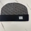 Europeiska designer snö beanies kvinnor män vinter ull mössor med kontrollerad stickad mode skid cap unisex märke skalle mössor varm hatt