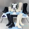 Bottes de créateurs automne et hiver Top marque femmes en cuir brillant et nylon à lacets talons hauts