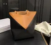 Väskor Designer Spanien Bag Lowe Totes Puzzle Fold Girl Cowhide Deformerad Geometrisk hink stor kapacitet Enkel axel Tote Creative Mortile Underarm Shopping